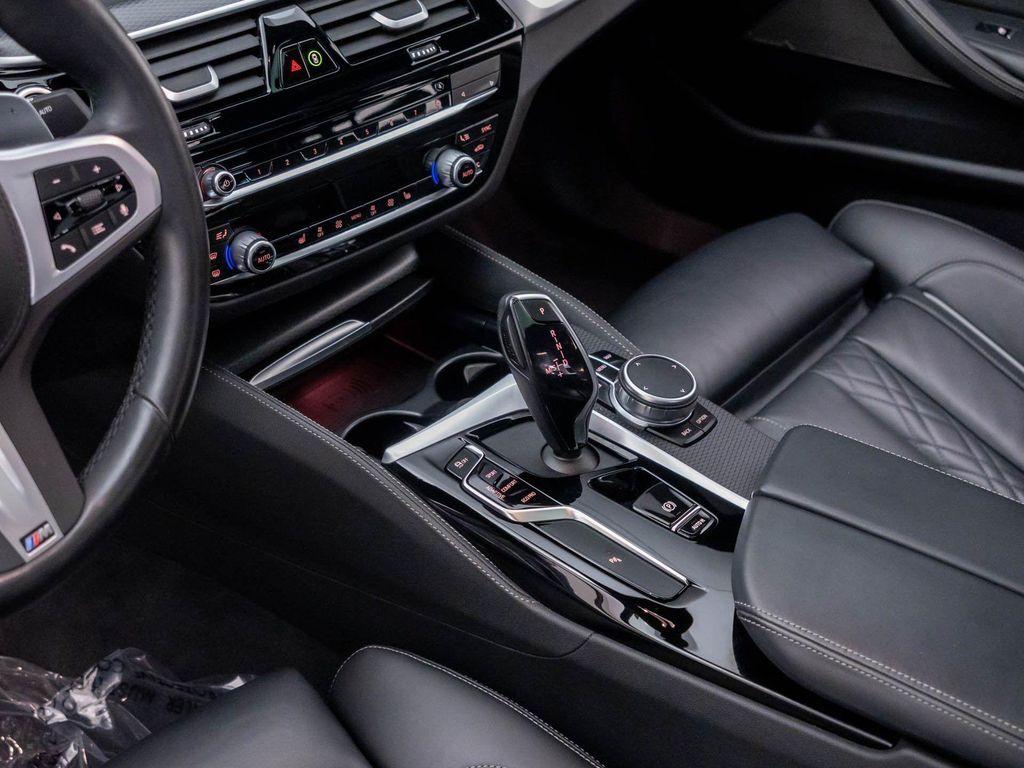 used 2023 BMW M550 car, priced at $63,412