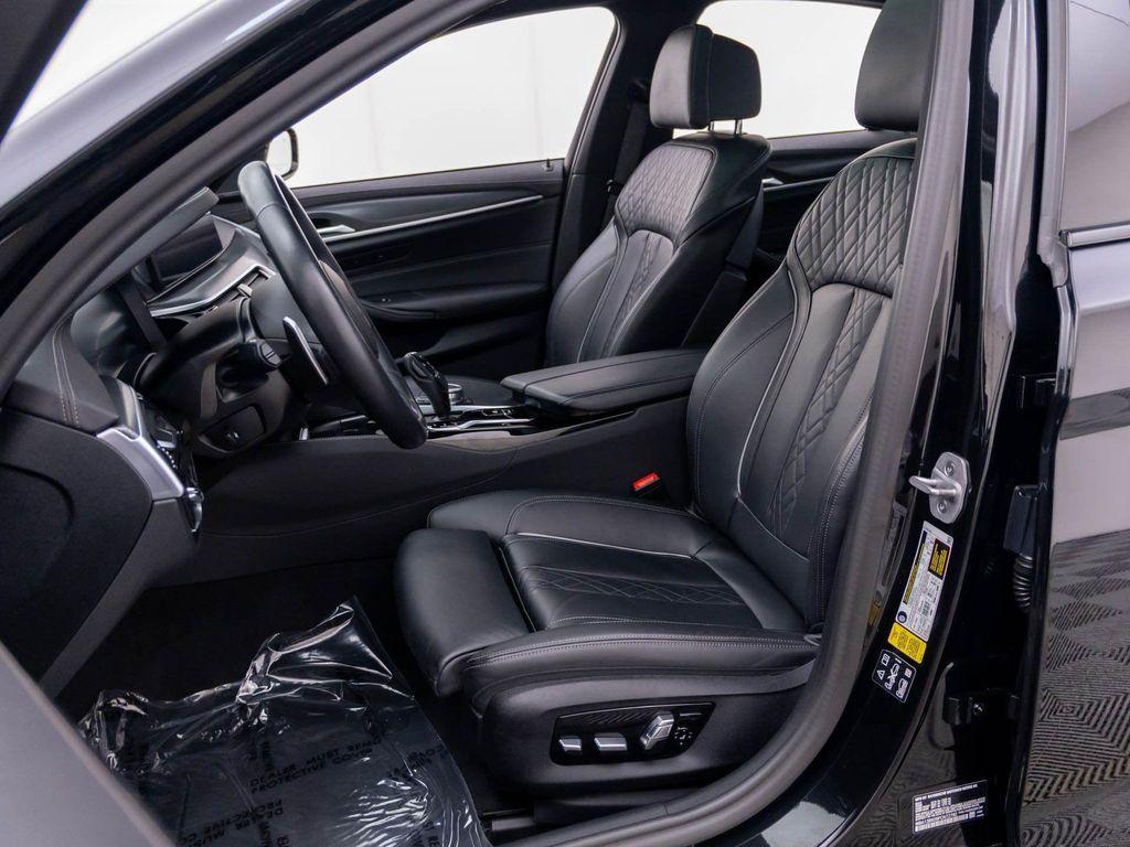 used 2023 BMW M550 car, priced at $63,412