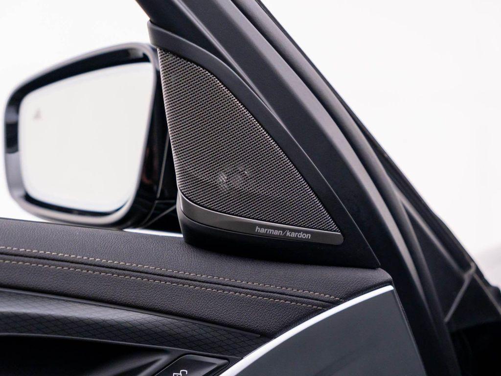 used 2023 BMW M550 car, priced at $63,412