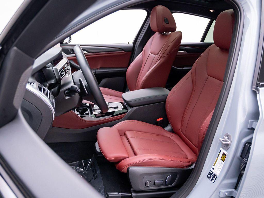used 2025 BMW X4 car, priced at $52,412