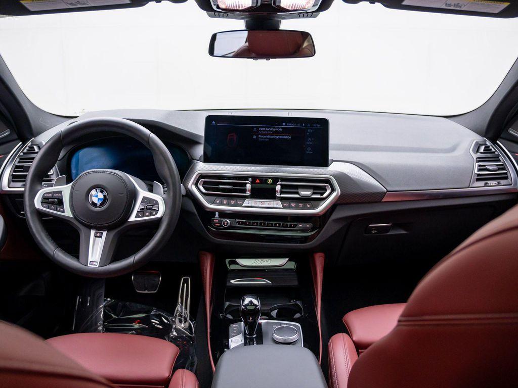 used 2025 BMW X4 car, priced at $52,412