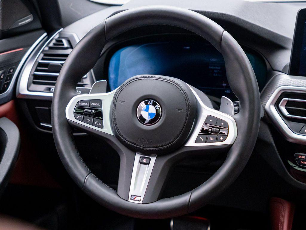 used 2025 BMW X4 car, priced at $52,412