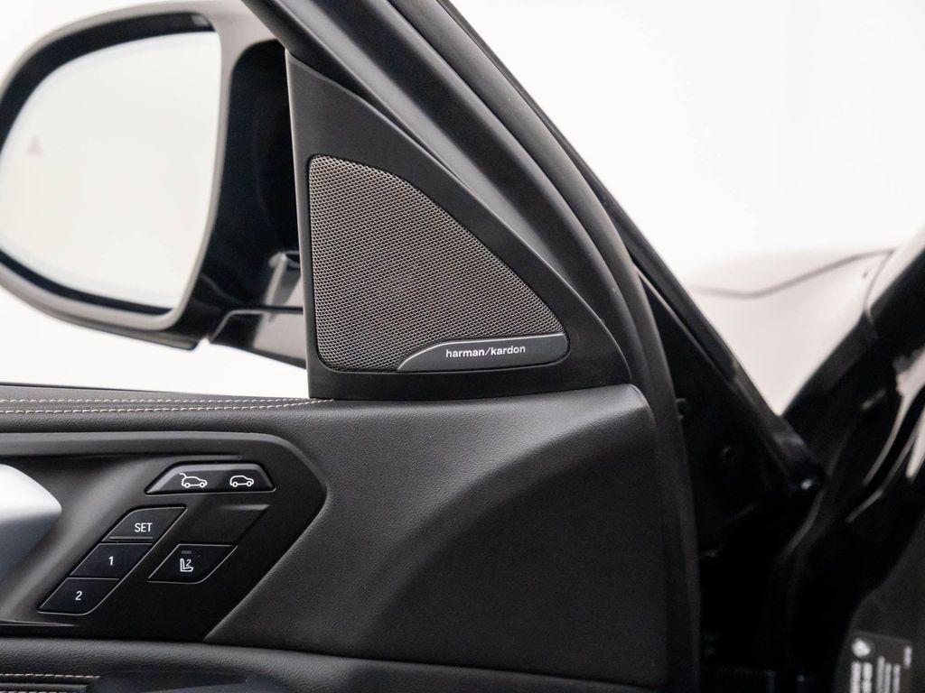used 2024 BMW X6 car, priced at $77,412