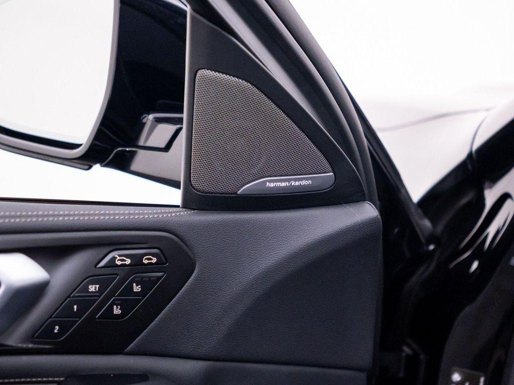 used 2023 BMW X6 car, priced at $63,412