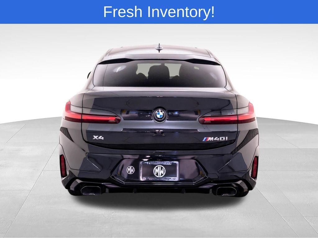 used 2025 BMW X4 car, priced at $65,912
