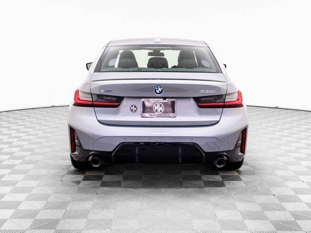 new 2026 BMW 330 car, priced at $59,952