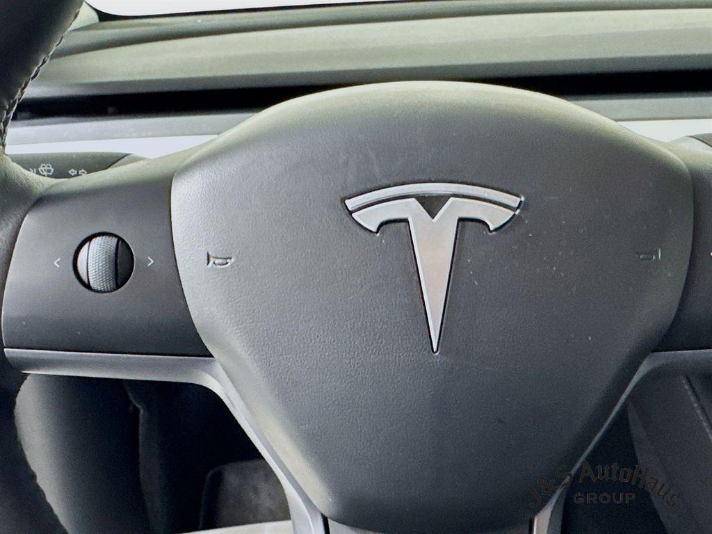 used 2024 Tesla Model Y car, priced at $34,995