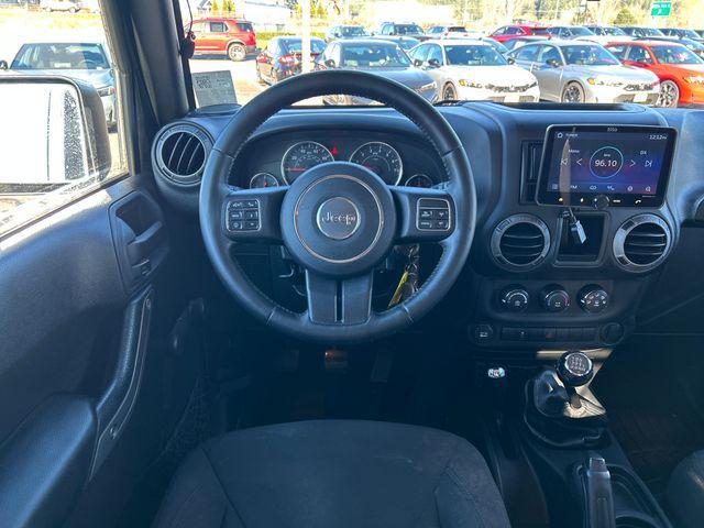 used 2015 Jeep Wrangler car, priced at $14,232