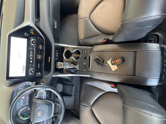used 2024 Toyota Highlander Hybrid car, priced at $48,996