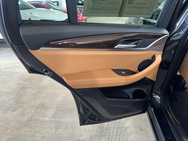 used 2025 BMW X4 car, priced at $47,884