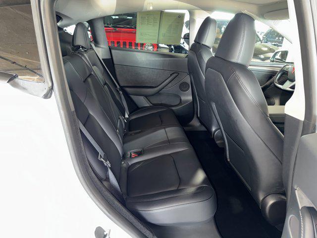 used 2023 Tesla Model Y car, priced at $34,219