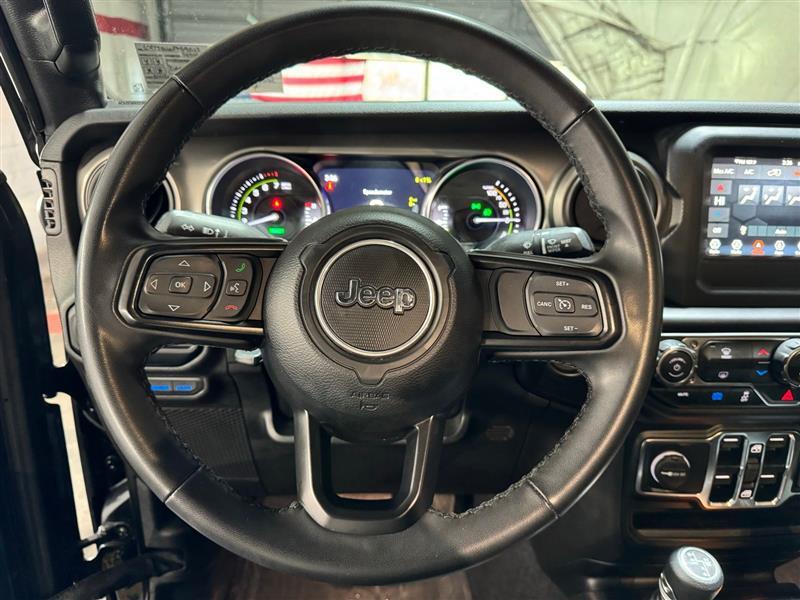 used 2023 Jeep Wrangler 4xe car, priced at $27,977