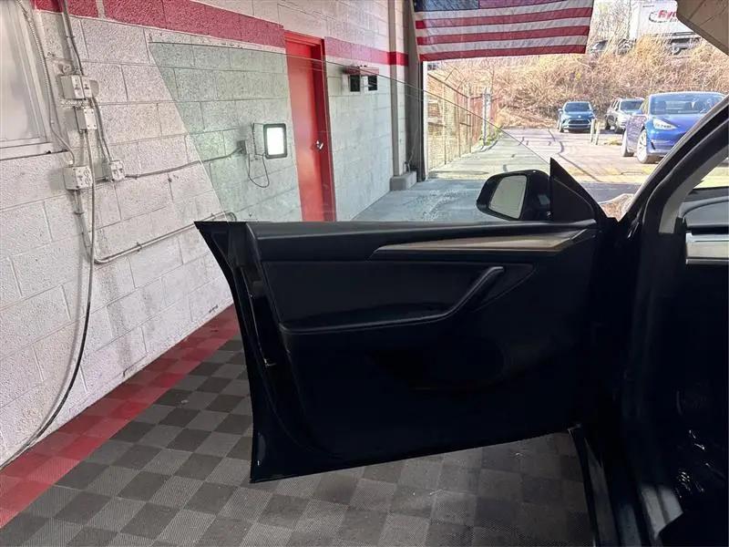 used 2023 Tesla Model Y car, priced at $27,755