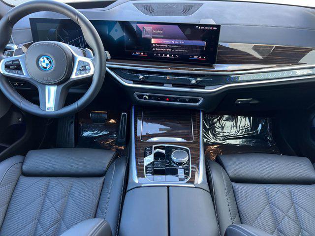 used 2026 BMW X5 PHEV car, priced at $70,744