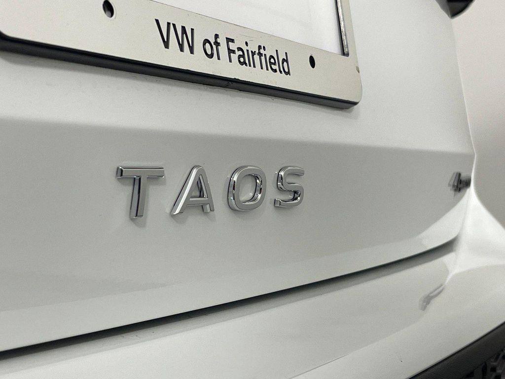used 2025 Volkswagen Taos car, priced at $33,083