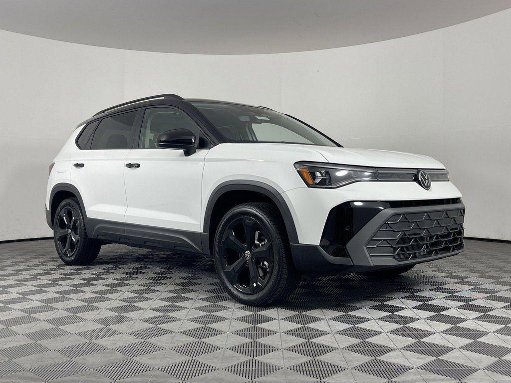 used 2025 Volkswagen Taos car, priced at $33,083
