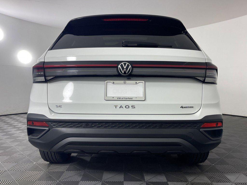 used 2025 Volkswagen Taos car, priced at $33,083