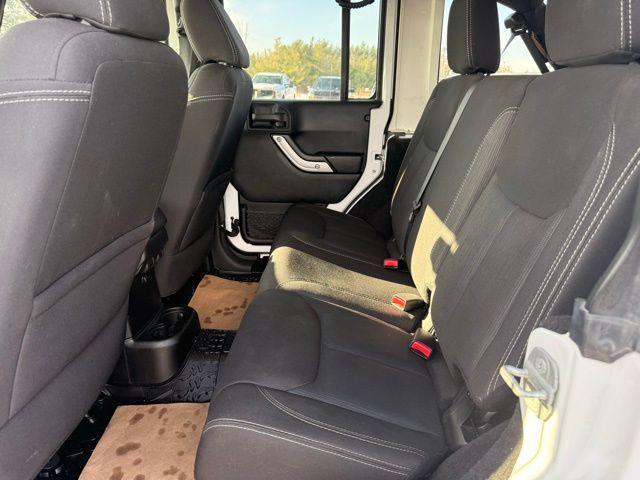 used 2014 Jeep Wrangler Unlimited car, priced at $17,753