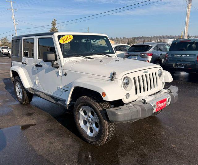 used 2014 Jeep Wrangler Unlimited car, priced at $17,753
