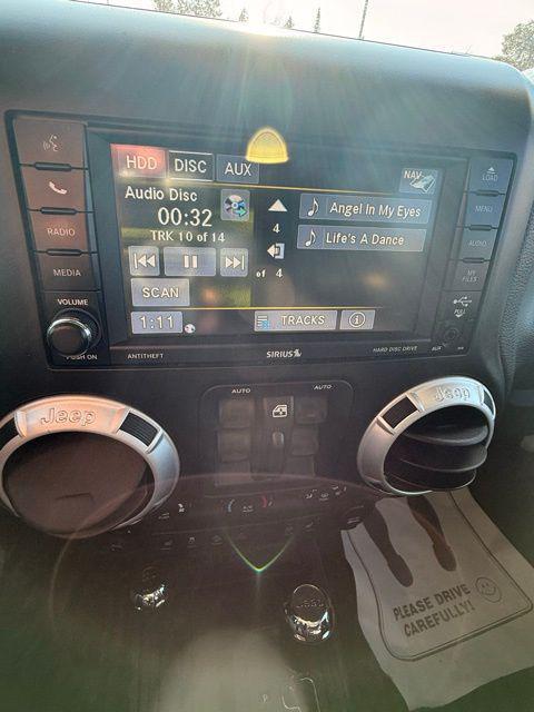 used 2014 Jeep Wrangler Unlimited car, priced at $17,753