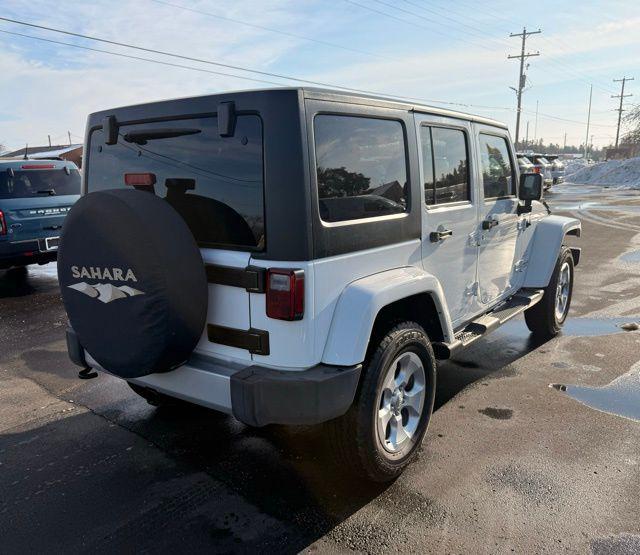 used 2014 Jeep Wrangler Unlimited car, priced at $17,753