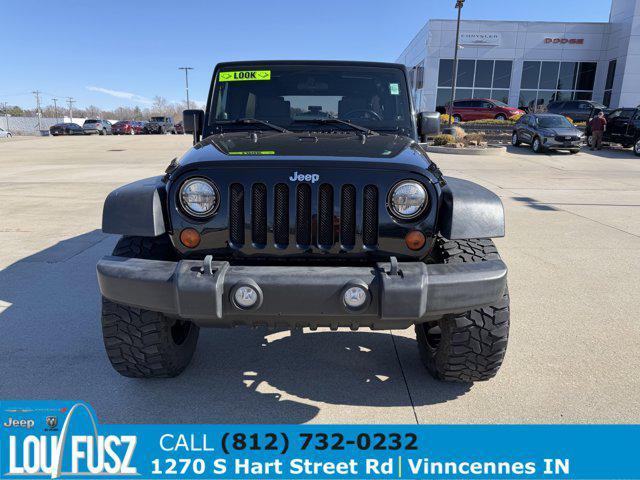 used 2010 Jeep Wrangler Unlimited car, priced at $12,879