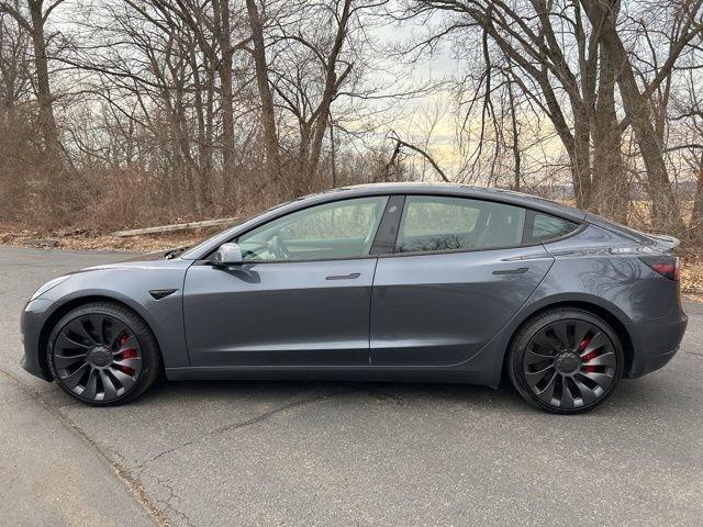 used 2023 Tesla Model 3 car, priced at $32,489