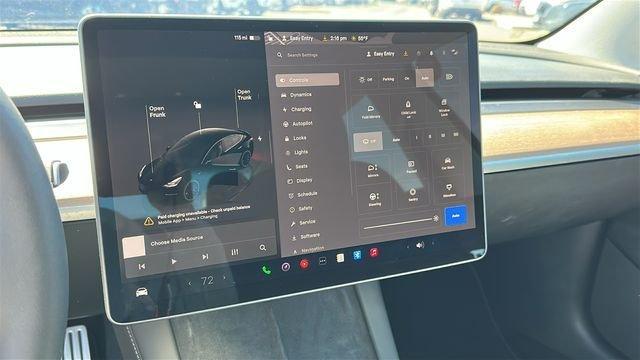 used 2023 Tesla Model 3 car, priced at $33,489