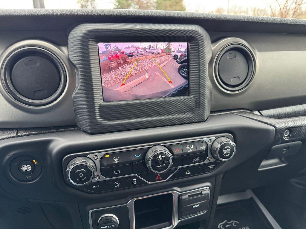 used 2023 Jeep Wrangler car, priced at $28,607