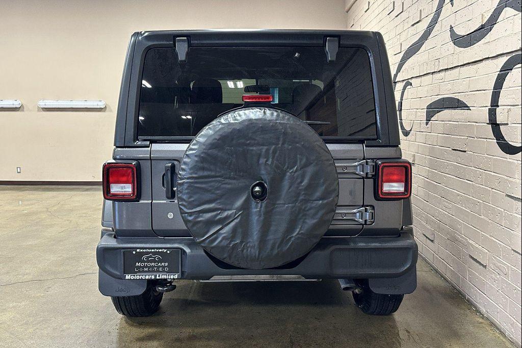 used 2023 Jeep Wrangler car, priced at $28,607