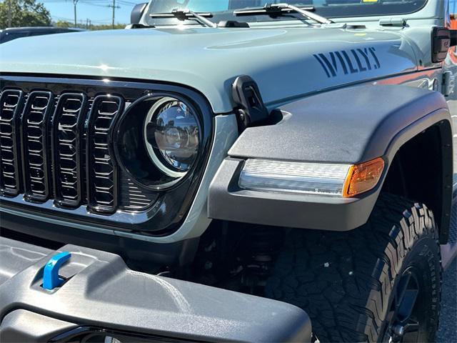 used 2024 Jeep Wrangler 4xe car, priced at $33,978