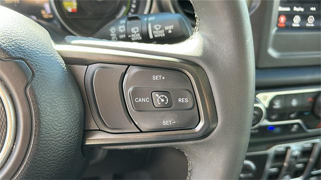 used 2023 Jeep Wrangler 4xe car, priced at $29,978