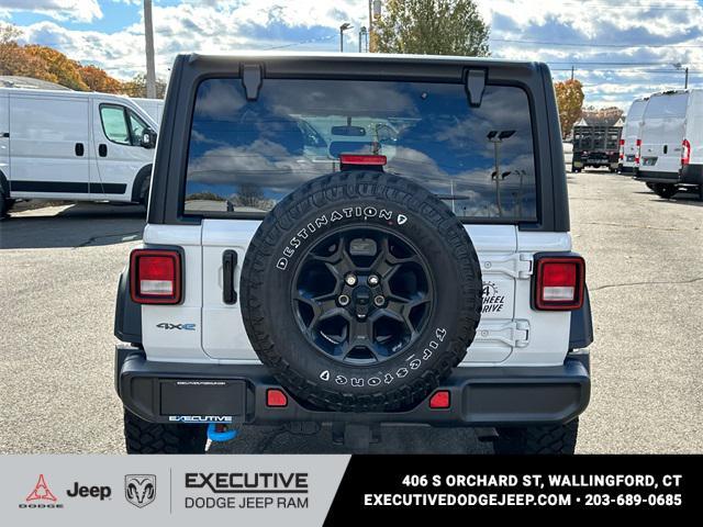 used 2023 Jeep Wrangler 4xe car, priced at $29,978