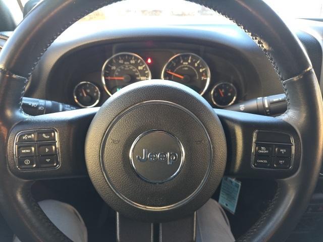 used 2014 Jeep Wrangler Unlimited car, priced at $9,900