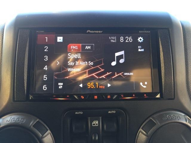 used 2014 Jeep Wrangler Unlimited car, priced at $9,900