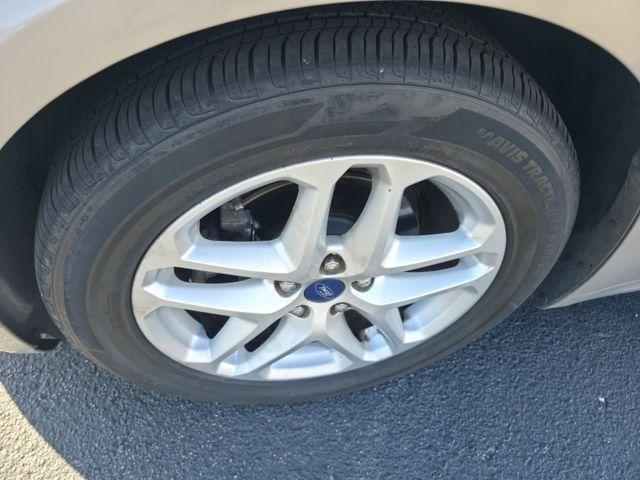 used 2015 Ford Fusion car, priced at $5,721