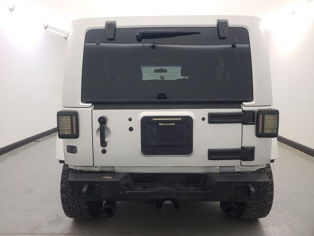 used 2012 Jeep Wrangler Unlimited car, priced at $13,988