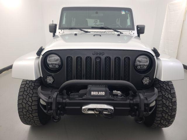 used 2012 Jeep Wrangler Unlimited car, priced at $13,988