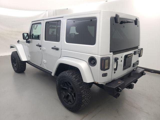 used 2012 Jeep Wrangler Unlimited car, priced at $13,988