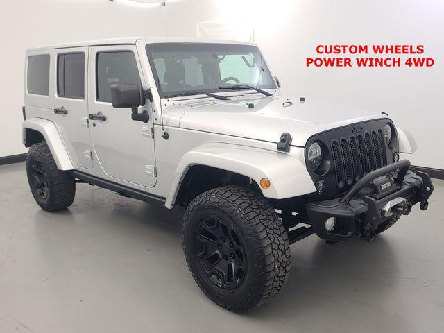used 2012 Jeep Wrangler Unlimited car, priced at $13,988