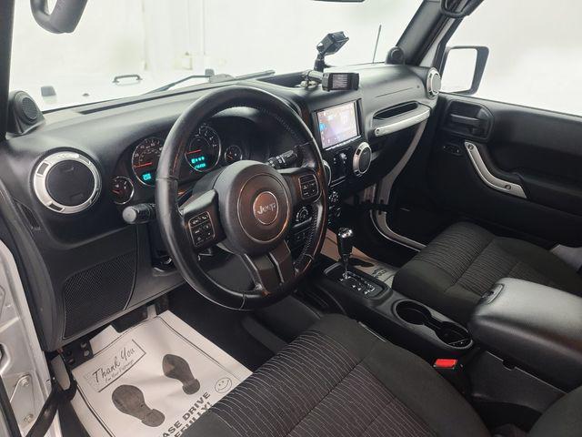 used 2012 Jeep Wrangler Unlimited car, priced at $13,988