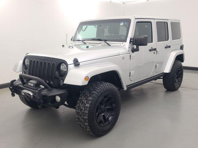 used 2012 Jeep Wrangler Unlimited car, priced at $13,988