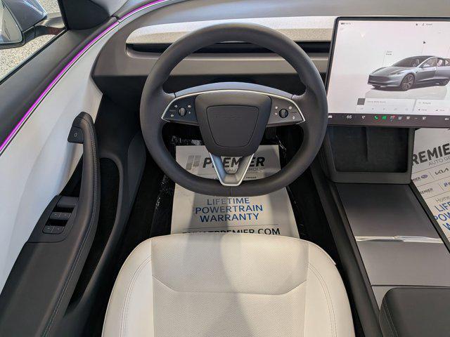 used 2025 Tesla Model 3 car, priced at $34,670