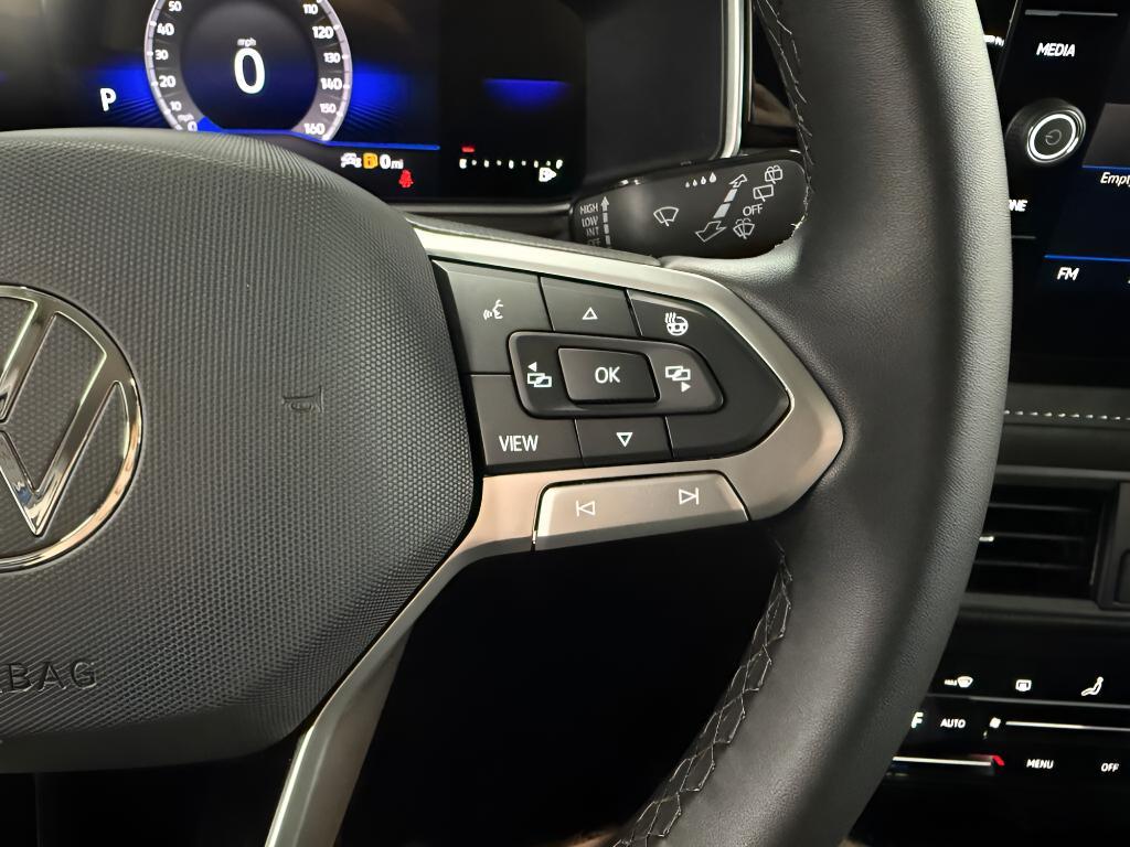 used 2025 Volkswagen Taos car, priced at $29,053