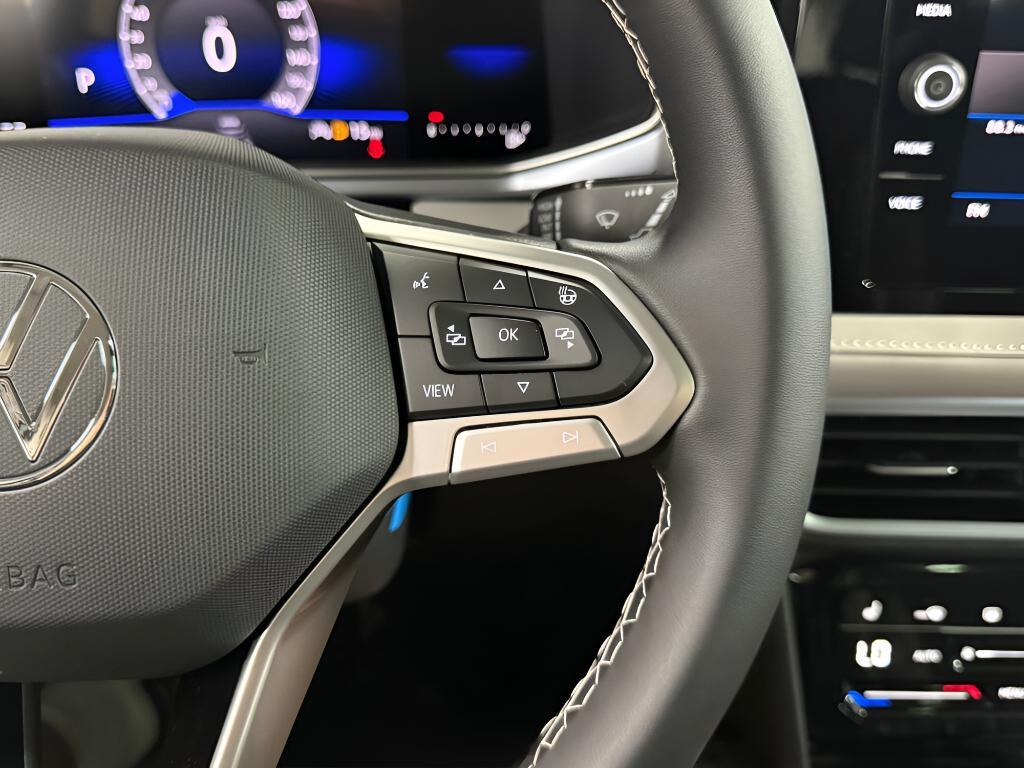 used 2025 Volkswagen Taos car, priced at $26,118