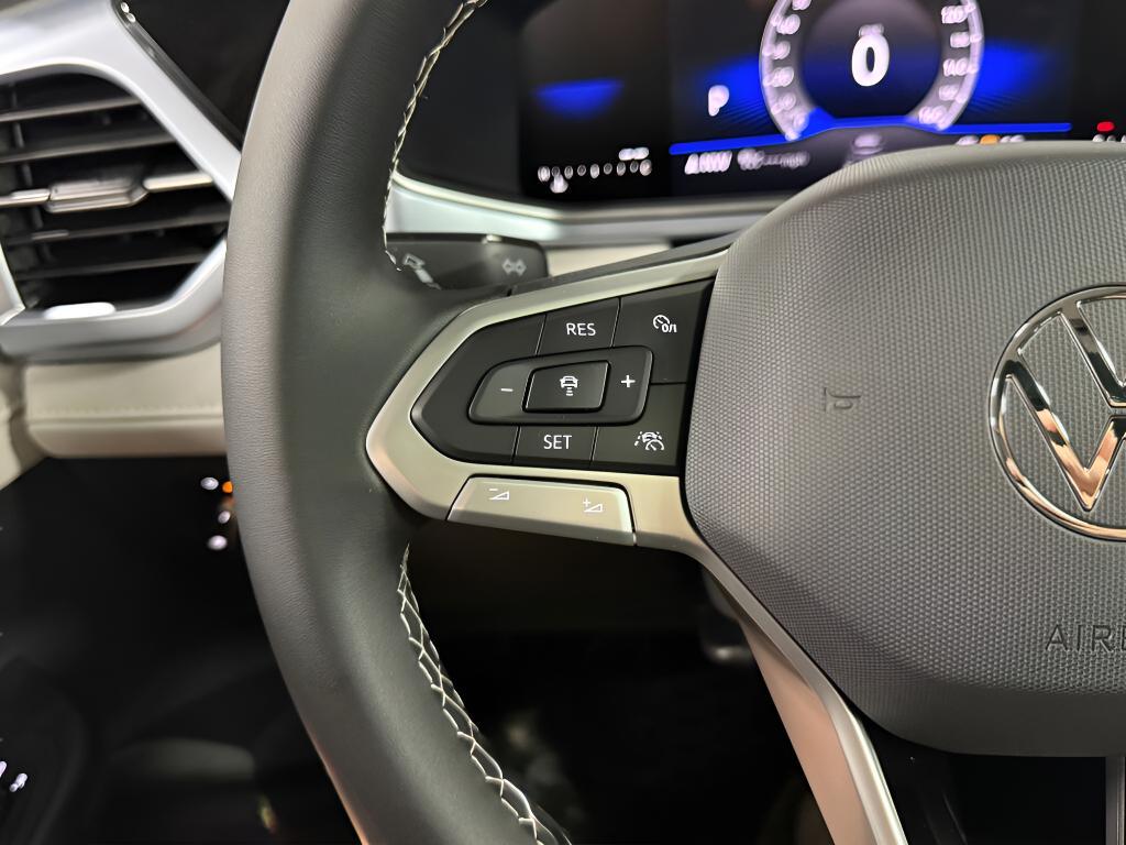 used 2025 Volkswagen Taos car, priced at $26,118