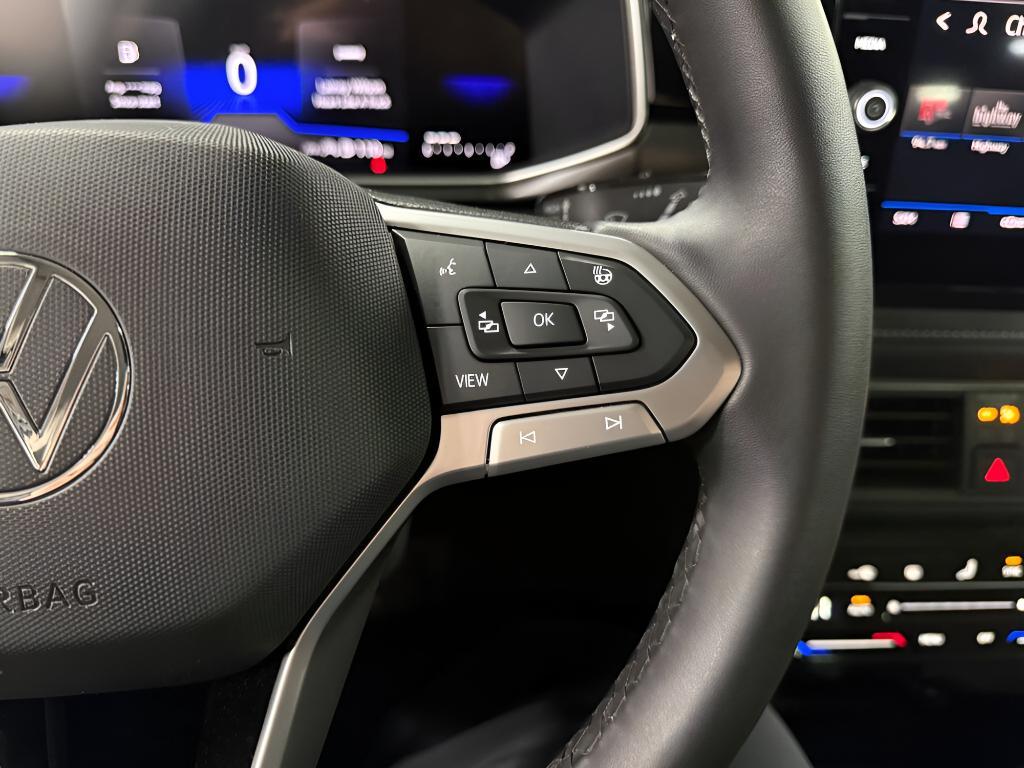 used 2025 Volkswagen Taos car, priced at $26,476