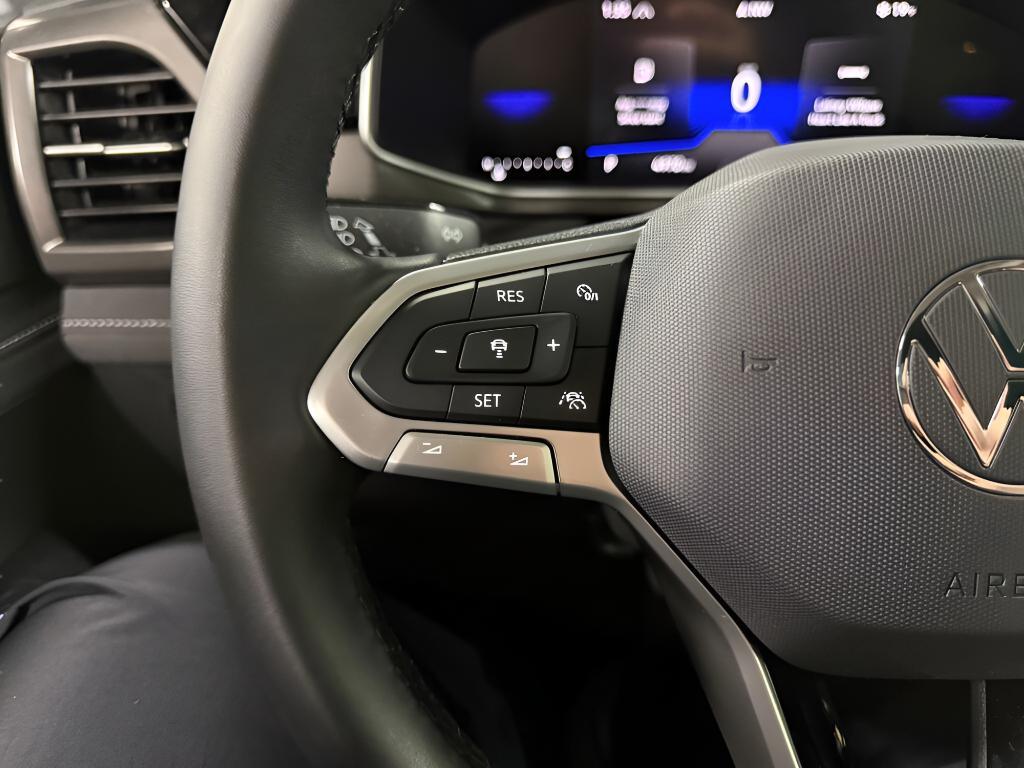 used 2025 Volkswagen Taos car, priced at $26,476