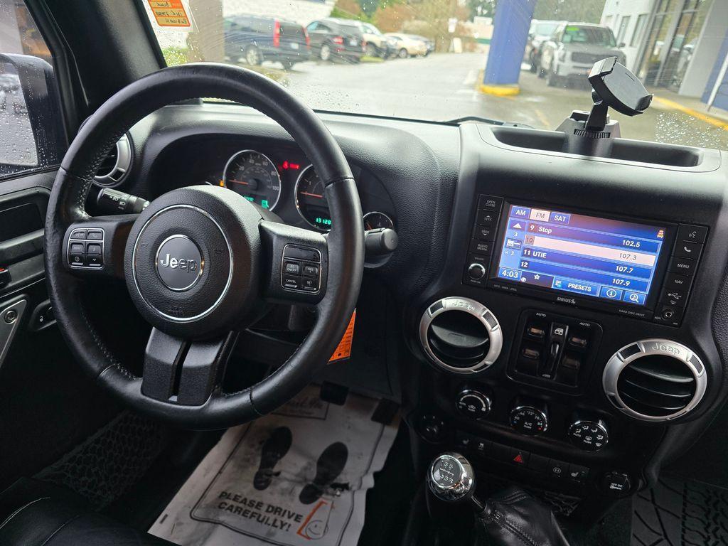 used 2012 Jeep Wrangler Unlimited car, priced at $13,730