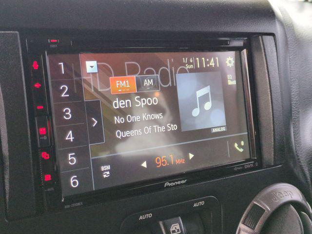 used 2011 Jeep Wrangler Unlimited car, priced at $13,970